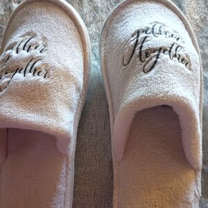 Gather together white slippers small in size. Like new condition